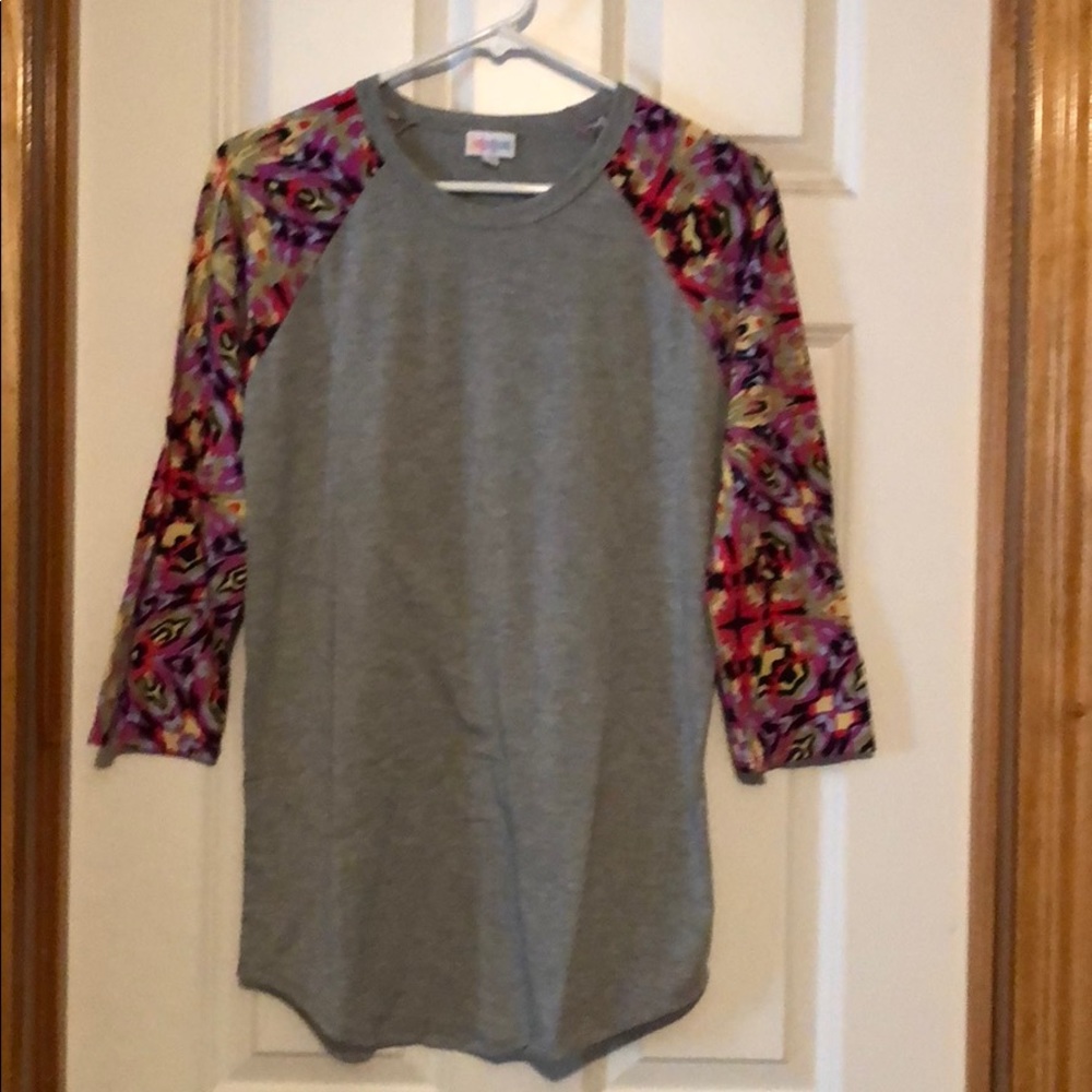 LuLaRoe top with patterned sleeves EUC Sz M